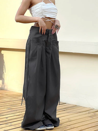 HIGH-WAIST WIDE-LEG PLEATED TROUSERS