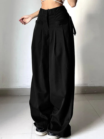 HIGH-WAIST WIDE-LEG PLEATED TROUSERS